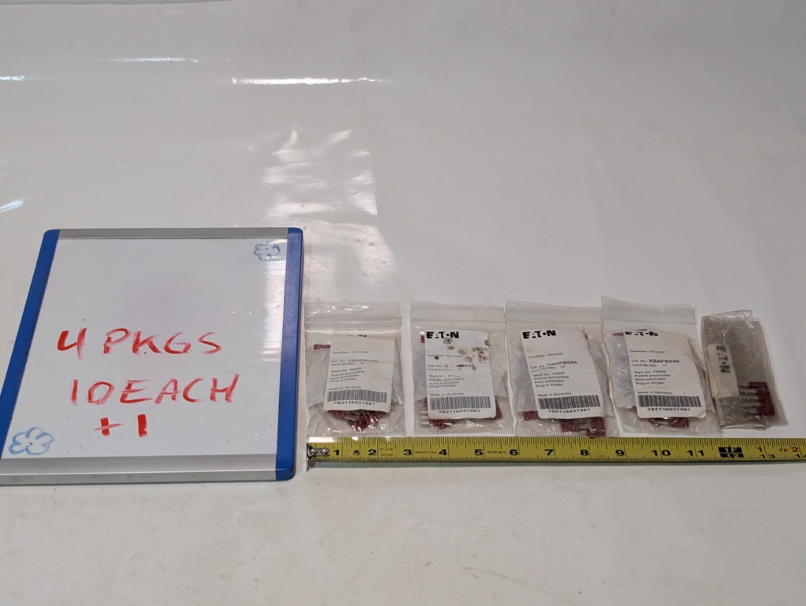 Eaton XBAFBS56 plug-in bridge jumpers, lot 4×10 + 1 extra, red, as shown