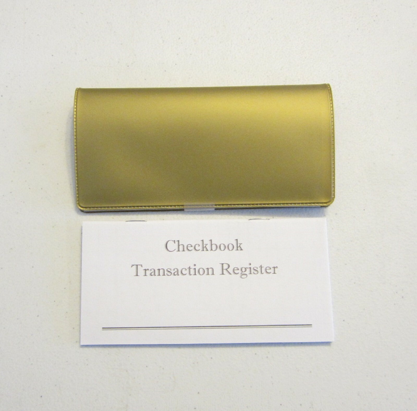 1 NEW GOLD VINYL CHECK BOOK COVER & 20 NEW CHECKBOOK TRANSACTION REGISTERS