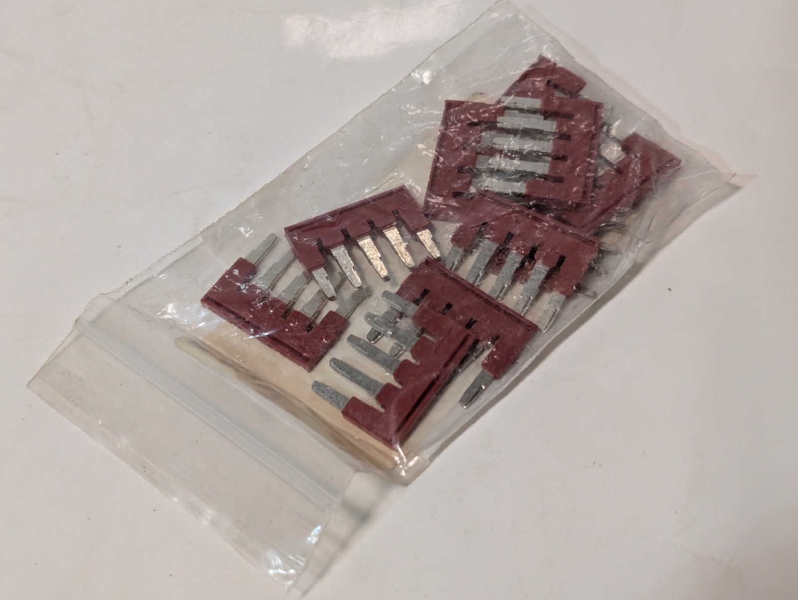 Eaton XBAFBS56 plug-in bridge jumpers, lot 4×10 + 1 extra, red, as shown