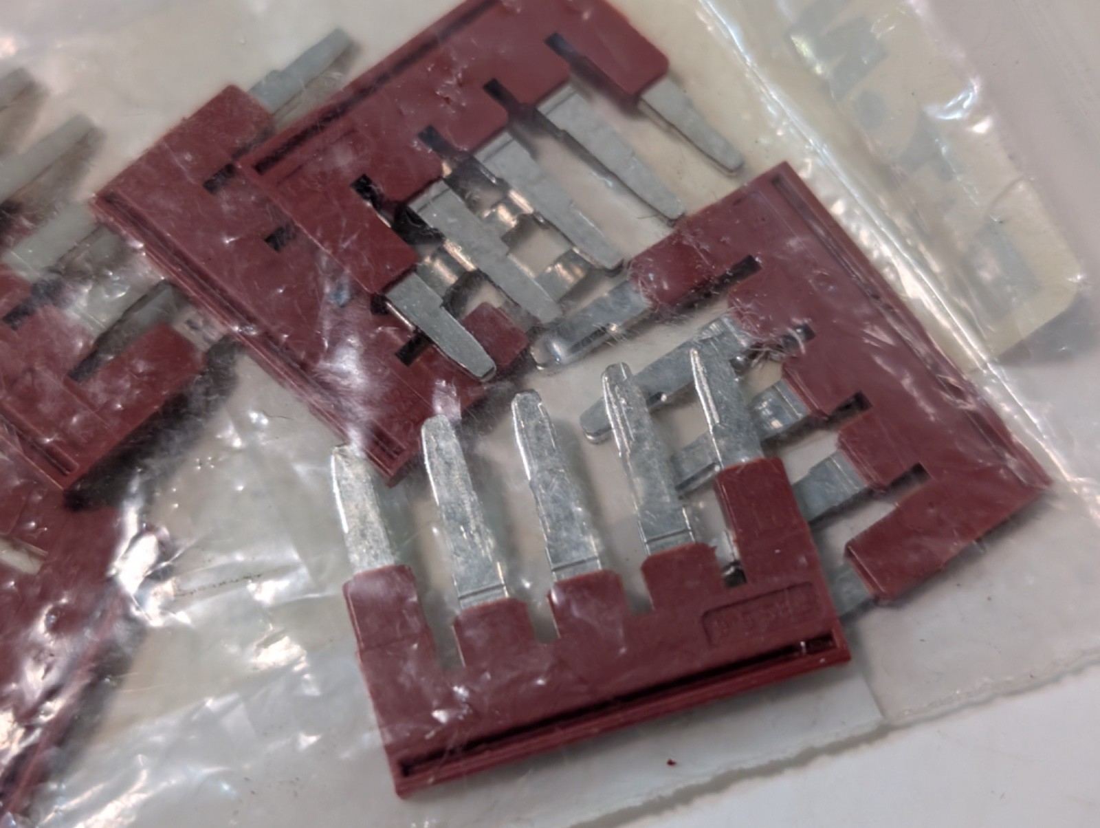 Eaton XBAFBS56 plug-in bridge jumpers, lot 4×10 + 1 extra, red, as shown