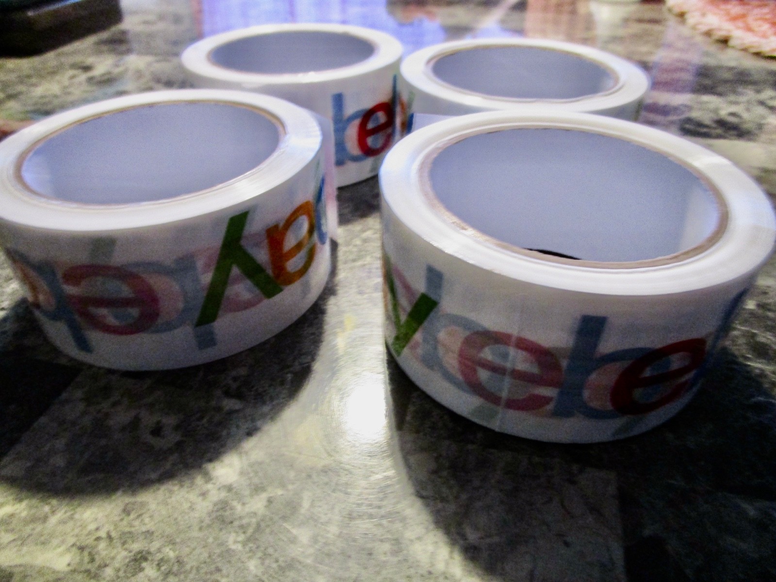 4 new Ebay branded rolls of PACKING TAPE 2″ X 75 yards per roll (FR)