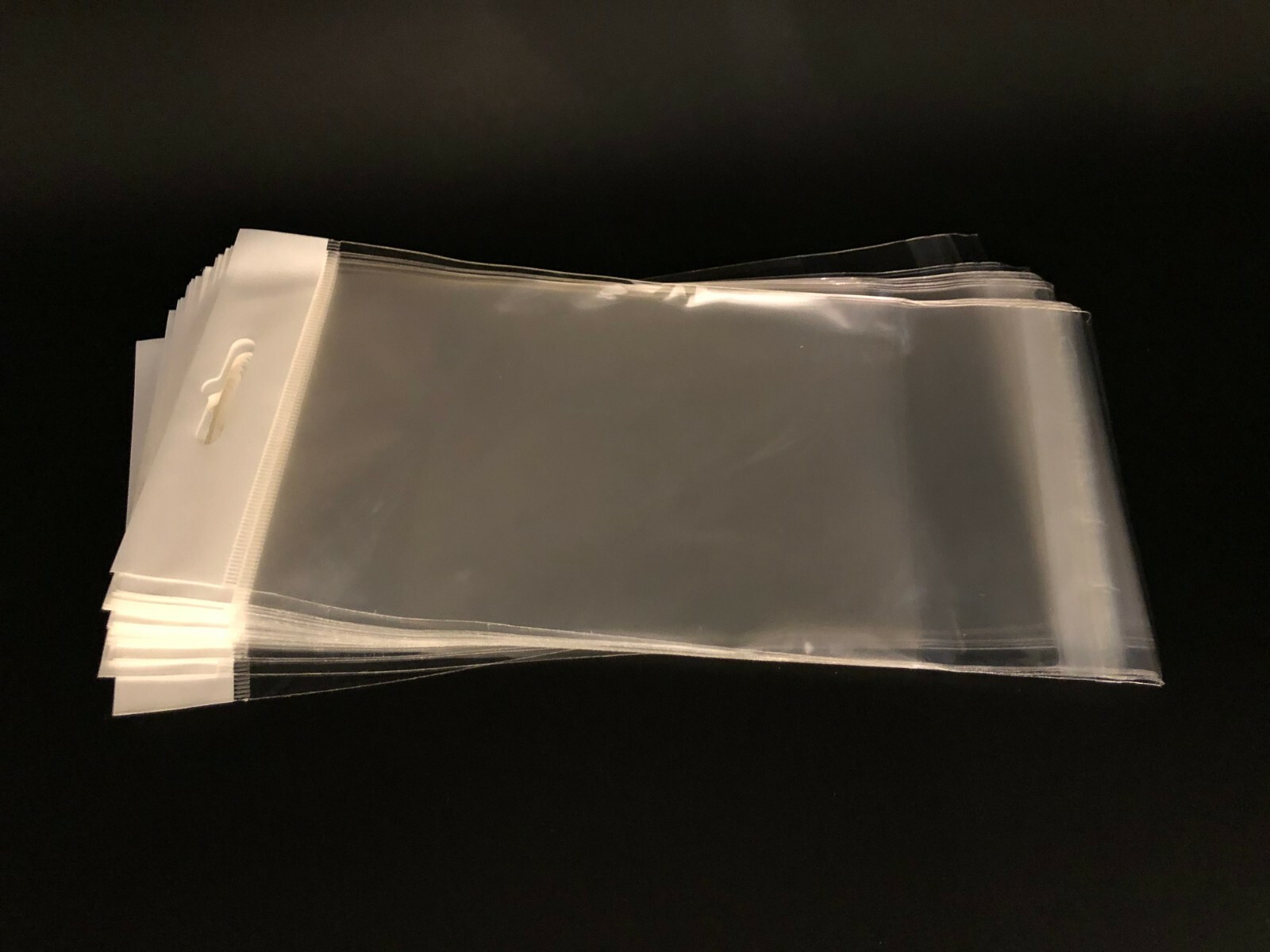 100 Clear Cello Bags HANG TOP, Resealable Self Adhesive OPP Poly Hang Hole bag