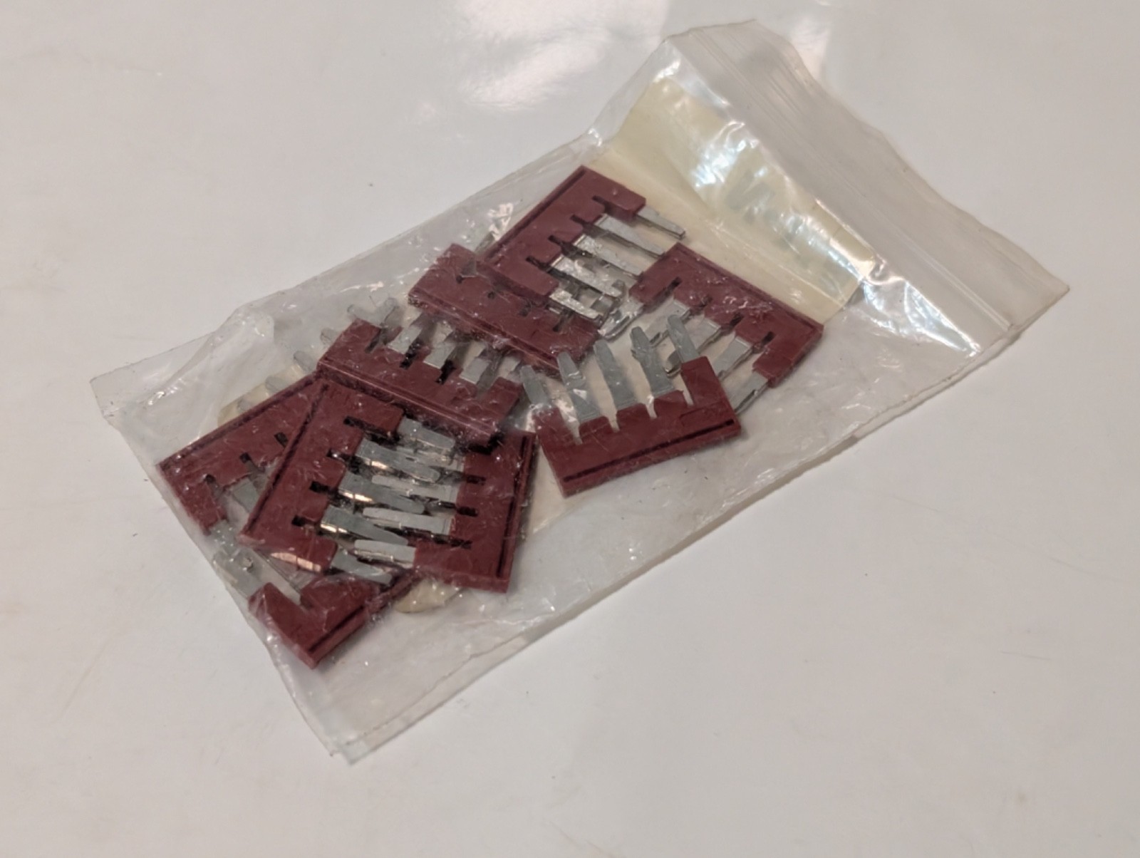 Eaton XBAFBS56 plug-in bridge jumpers, lot 4×10 + 1 extra, red, as shown