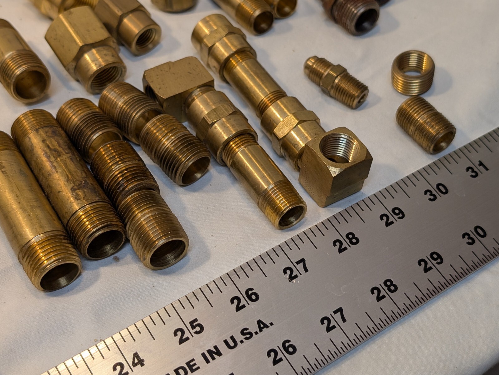 13 pounds of Brass fittings: 90 degree, nipples, 3/4″, 1/2″, valves, TAKE A LOOK