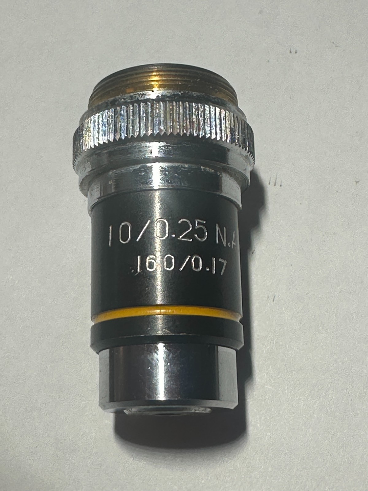 10/0.25 N.A. 160/0.17 Microscope Objective Bottom Yellow Stripe, Used